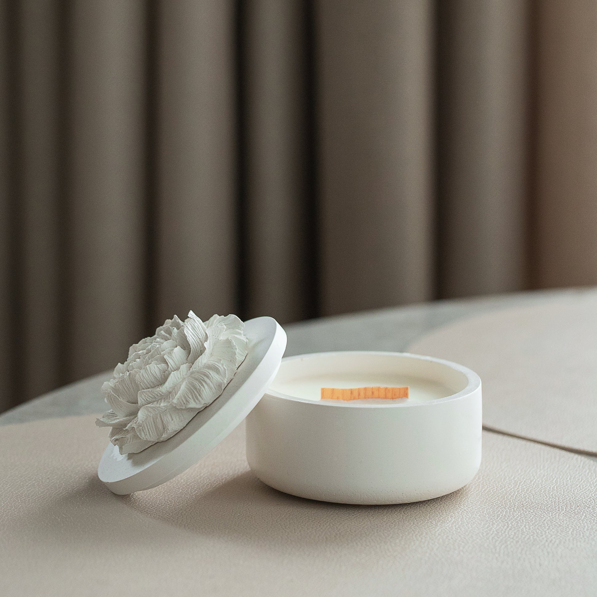 scented candle with peony flower
